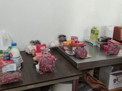 The vacuum\u002Dpacked boar meat along with the products that are packaged in boxes intended for needy families.